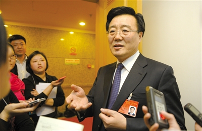 昨日，在十四屆人大二次會議順義代表團全團審議后，北京市人大代表、北京市常務副市長李士祥接受記者提問。新京報記者 浦峰 攝