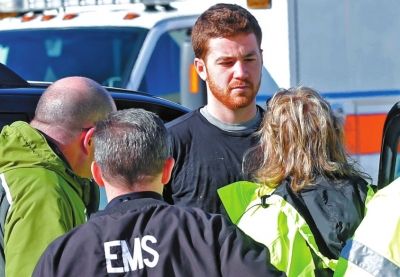 嫌犯接受詢(xún)問(wèn)。新華社/美聯(lián)