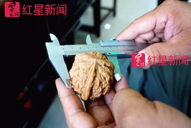 文玩核桃遇冷由幾萬一對(duì)降到5元沒人要？商戶否認(rèn)