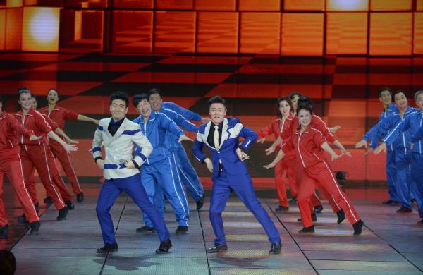 《小蘋果》、《最炫民族風(fēng)》等廣場舞曲將會有全國統(tǒng)一、編排科學(xué)、帶給人正能量的全新動作。 CFP 資料