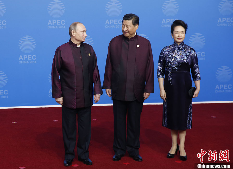 圖為習(xí)近平夫婦歡迎俄羅斯總統(tǒng)普京。中新社發(fā) 杜洋 攝