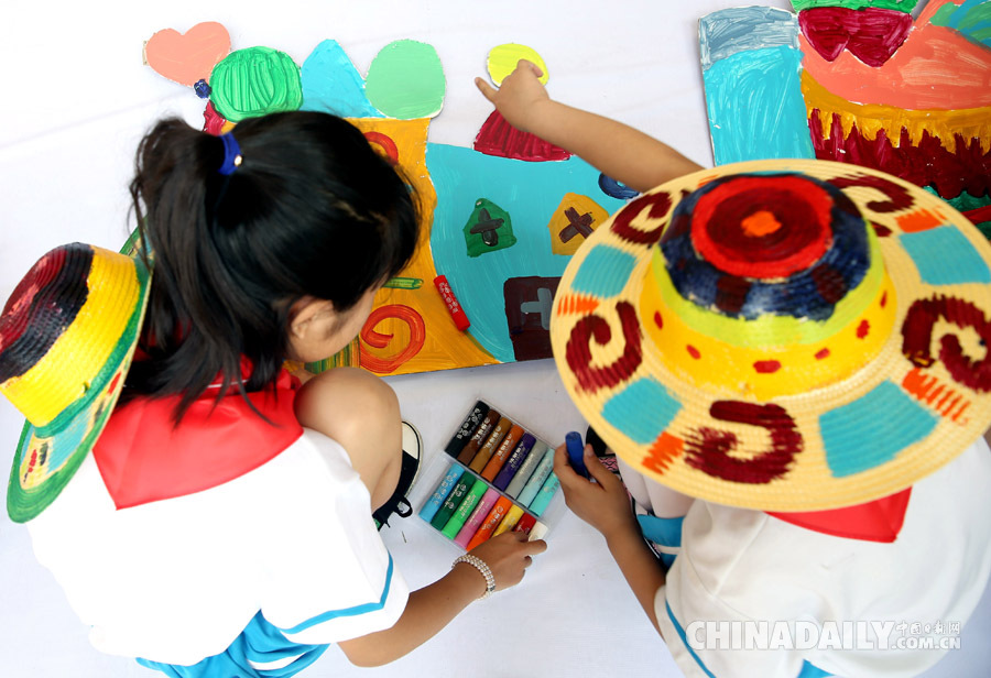 中國(guó)日?qǐng)?bào)聚焦各地迎“六一”兒童節(jié)