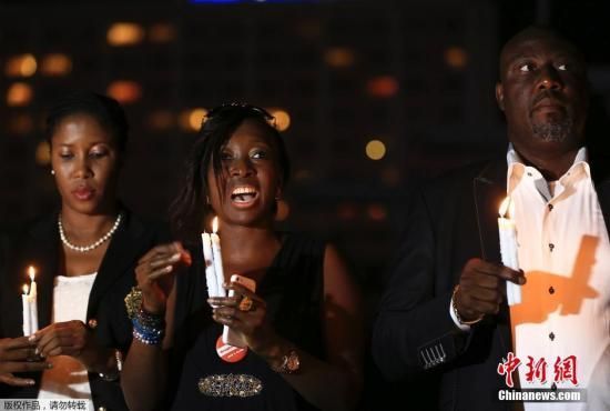 　資料圖：當地時間2014年8月26日，尼日利亞阿布賈，民眾舉行“帶回我們的女孩”活動為埃博拉病毒感